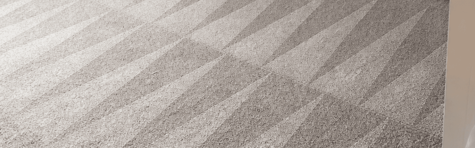 Just-cleaned carpet with even cleaning passes in a Katy, TX bedroom